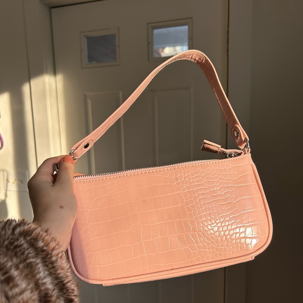 adorable pink mini purse. Perfect for a night out!